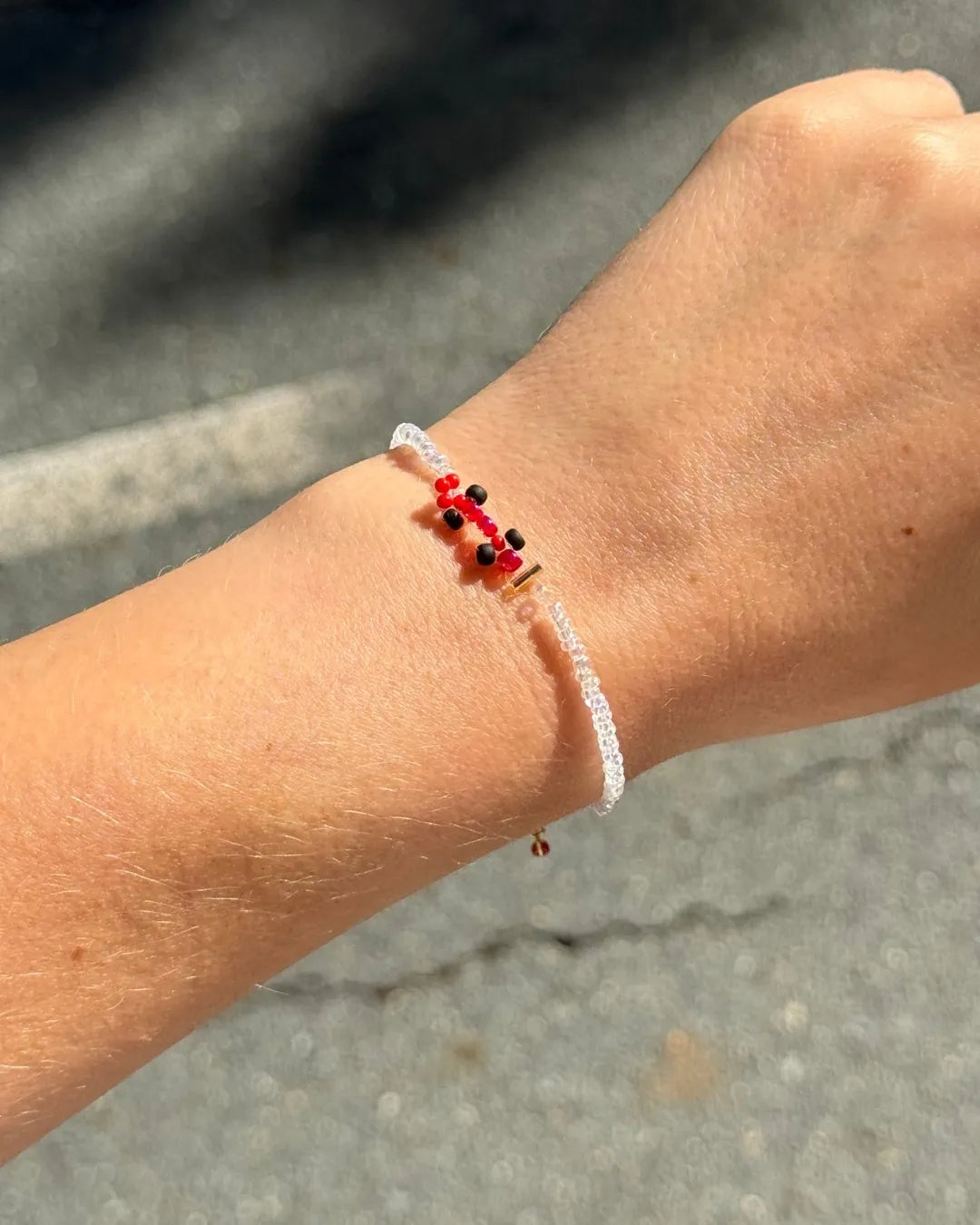 red | ferrari-inspired race car bracelet